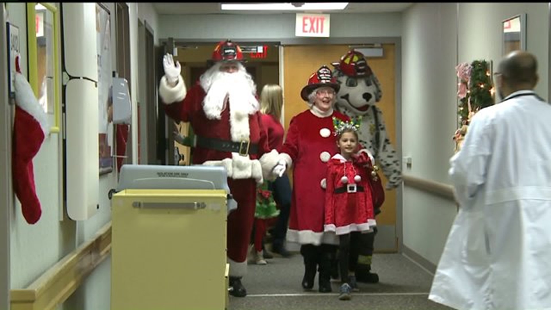 Santa, firefighters visit hospital