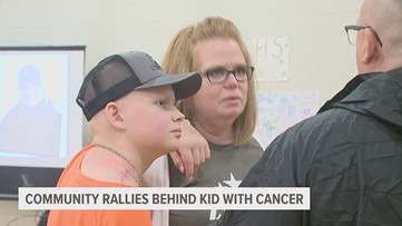 Community rallies behind 13 year old boy from Bettendorf who had arm amputated from cancer