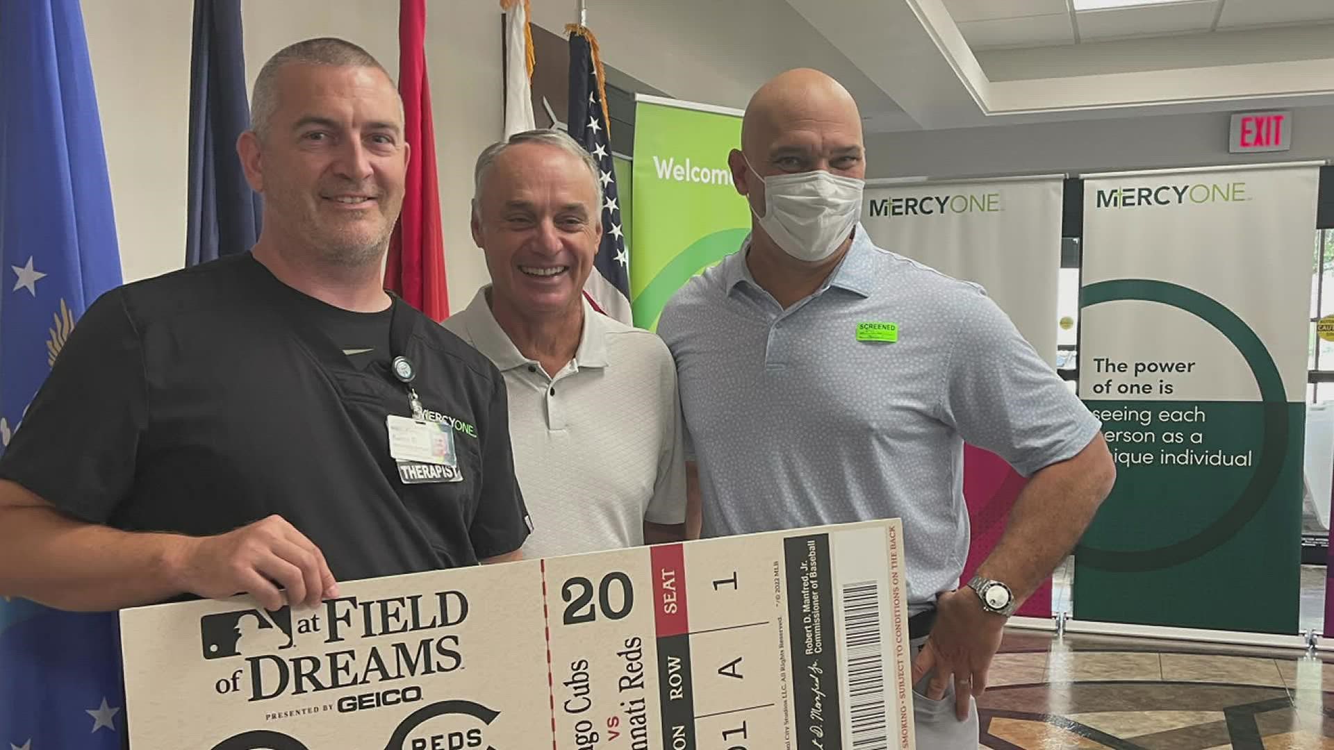 The MLB chief operations and strategy officer and the senior vice president of field operations personally handed over the tickets at MercyOne in Dubuque.