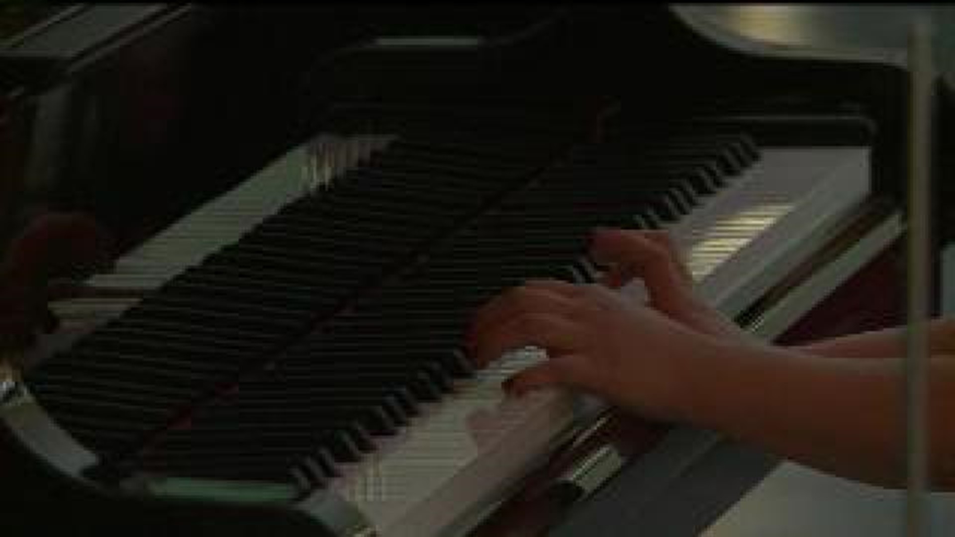 Kids help kids by playing piano