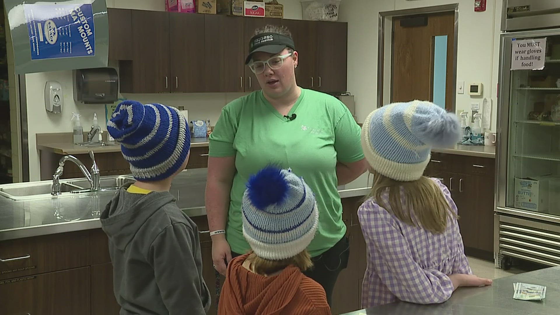 Chelsie Pettie works in the lunch room of St. Malachy School in Geneseo, but her handmade pieces of art make every child feel welcome at school.