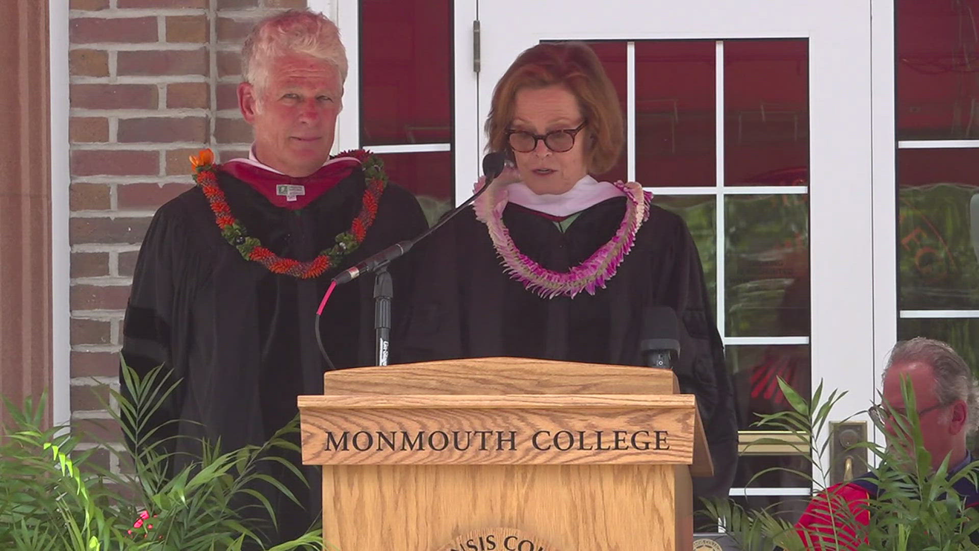 Sigourney Weaver and Jim Simpson earned honorary doctorates from Monmouth for their efforts in the arts and philanthropy.