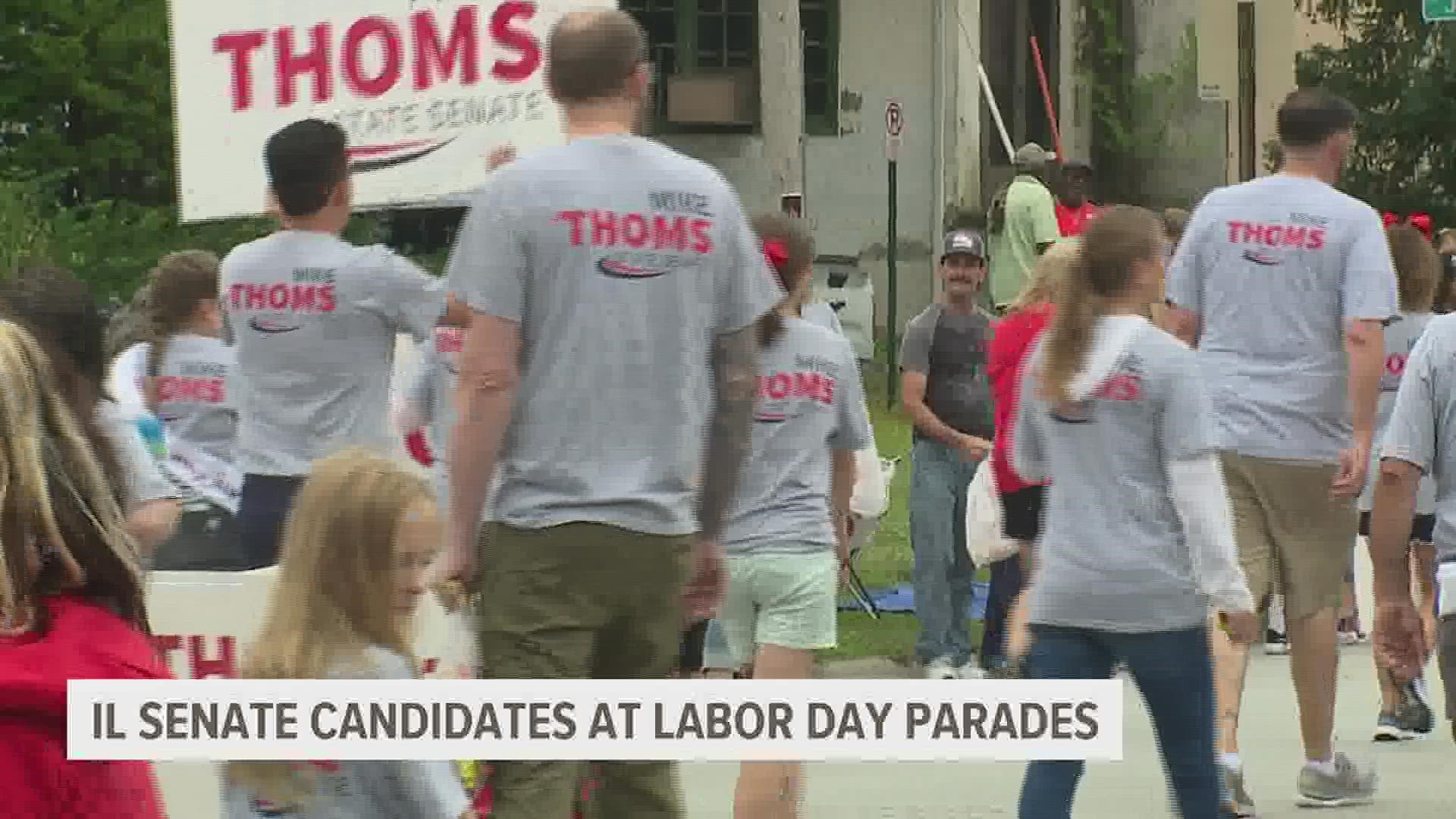 Democrat Mike Halpin and Republican Mike Thoms were both out at the parades, looking to gain more support as midterm elections near.