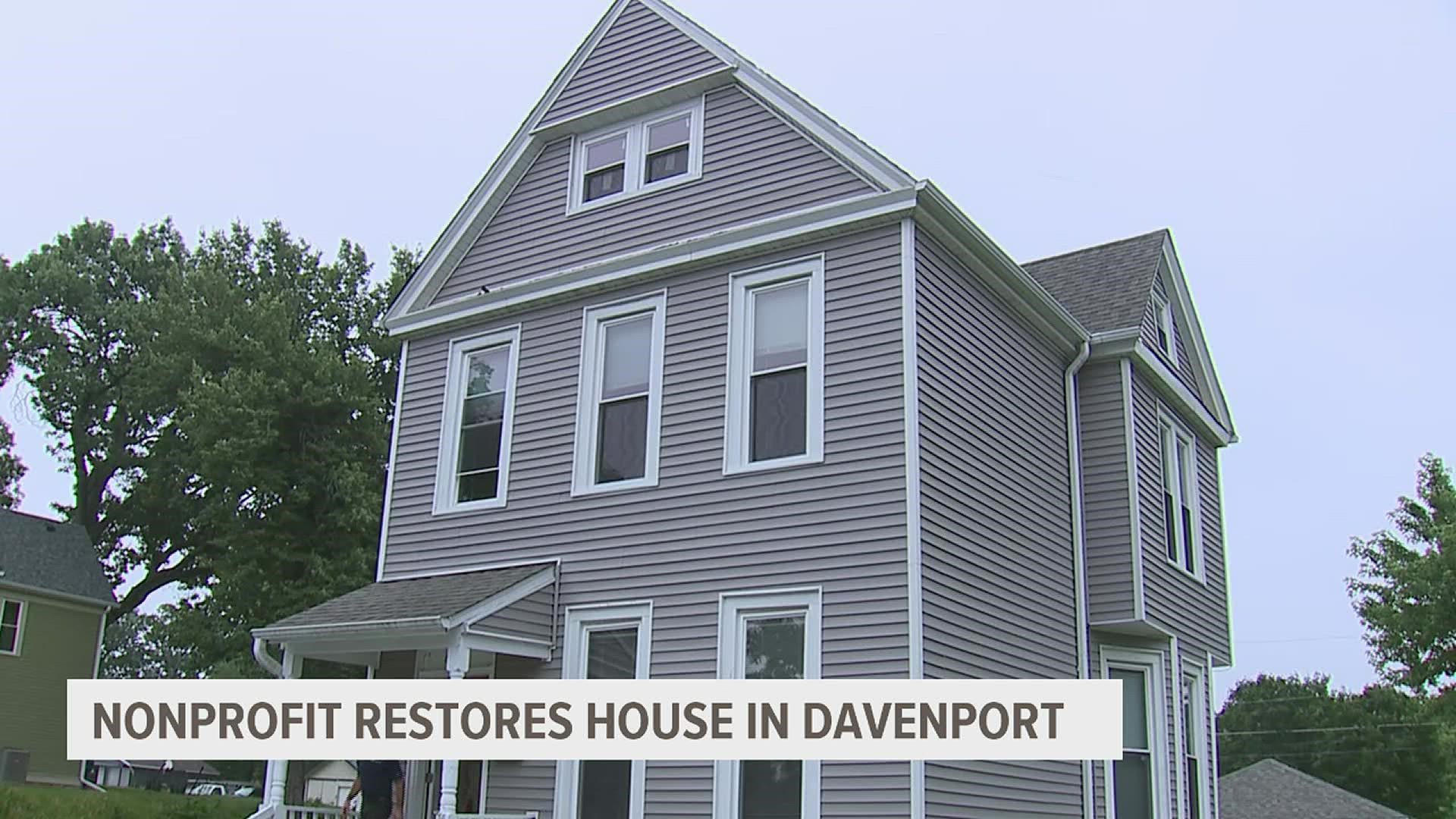 Rejuvenate Housing closed on their first restored property on Thursday with help from Quad Cities Bank and Trust.