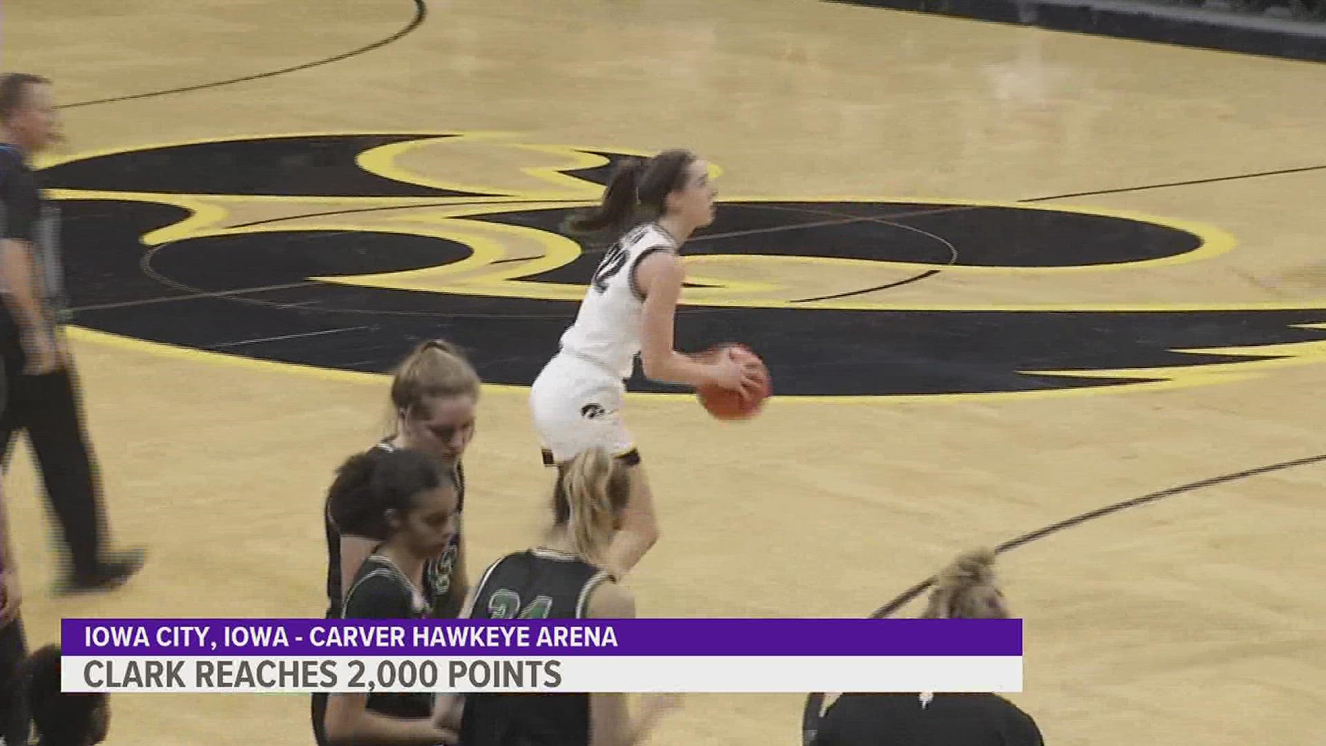 Caitlin Clark had 20 points, 10 rebounds and six assists, and reached 2,000 career points as No. 13 Iowa beat Dartmouth 92-54 for its fifth straight victory.