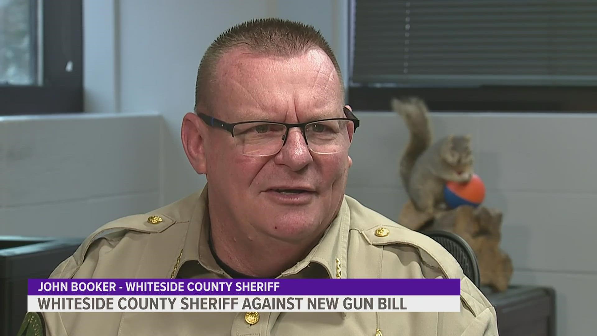 Whiteside County Sheriff John Booker told News 8's Cesar Sanchez that he won't be checking on gun owners to see if their weapons have been registered with the state.