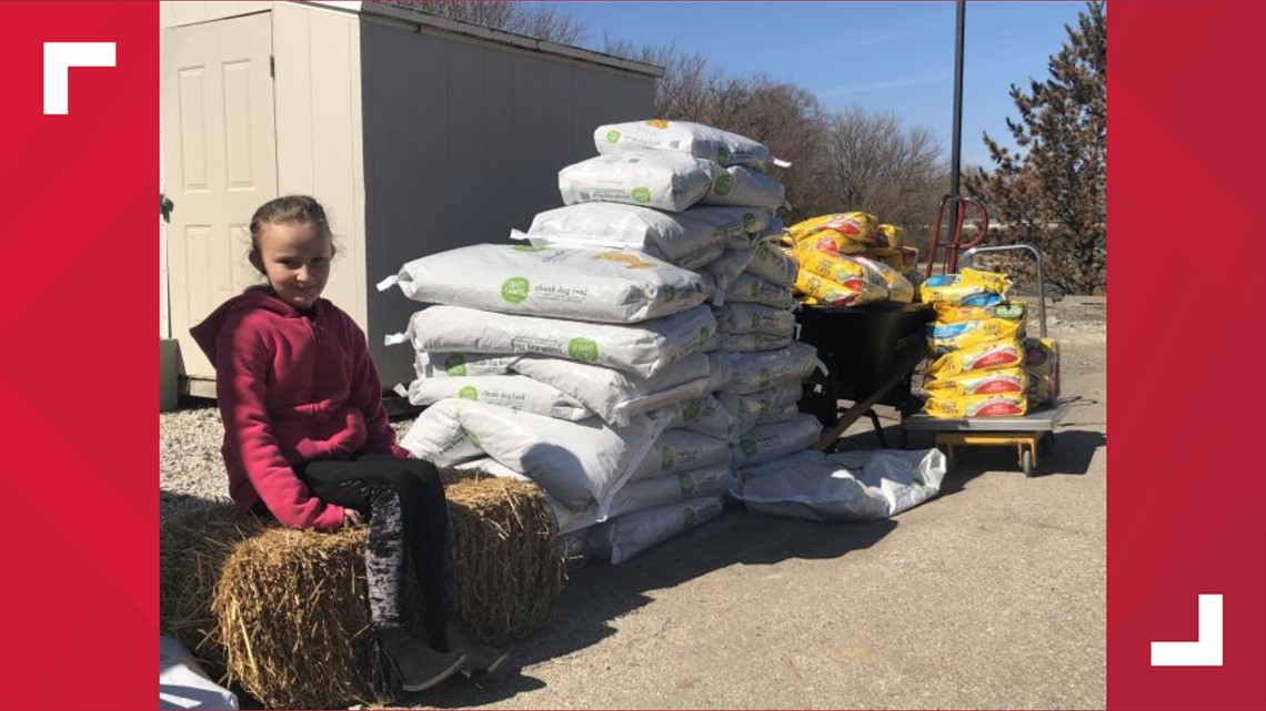 East Moline family donates 1000 pounds of pet food to QC Paws for