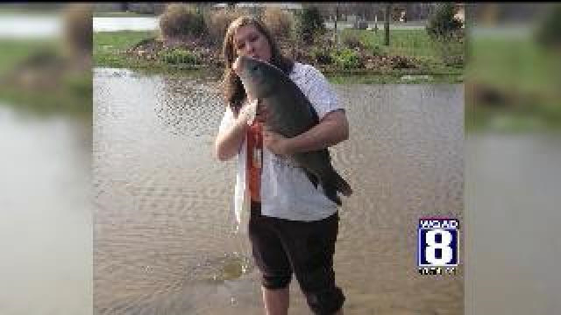 QC woman rescues giant fish from floodwaters