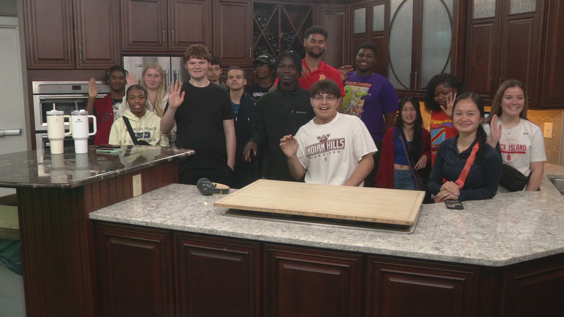 The students, who are taking a current events class, got to learn more about the media and toured News 8's studios.