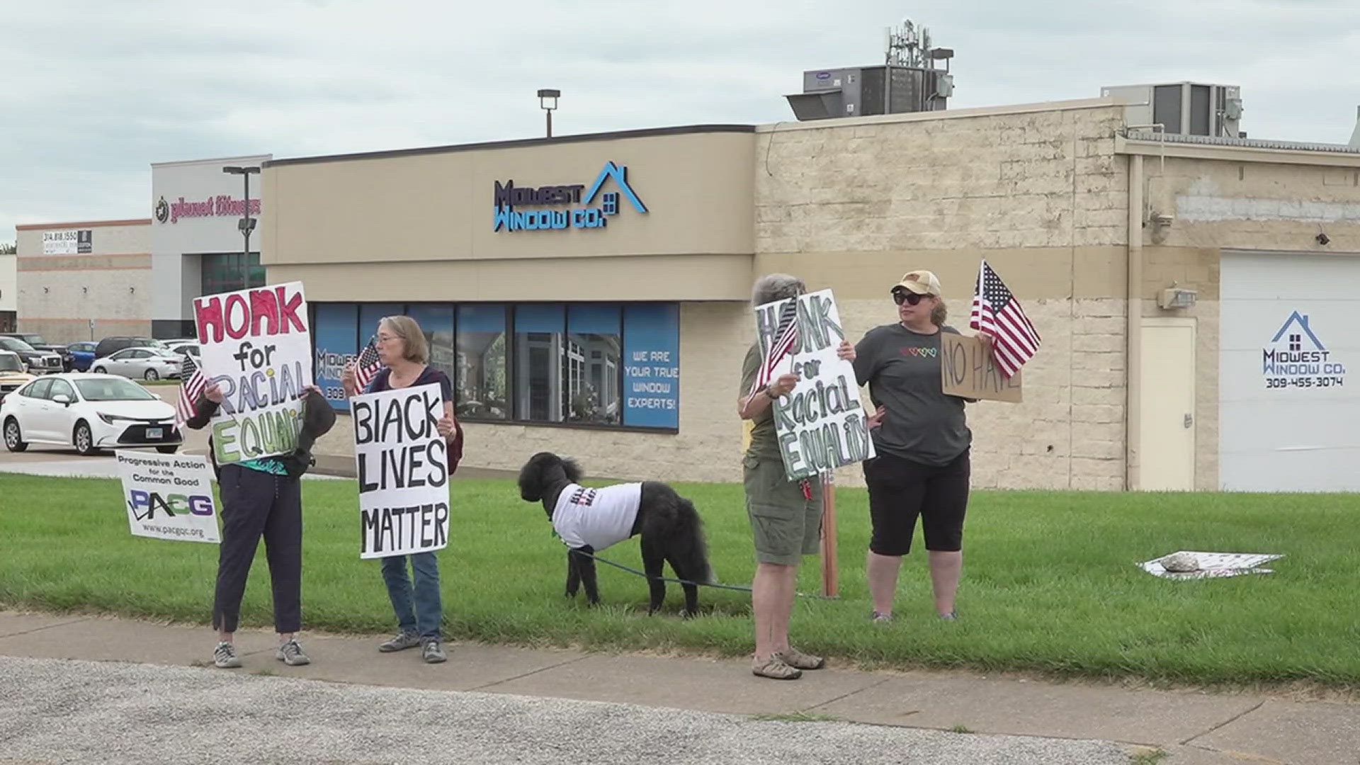 Progressive Action for the Common Good stands at the corner of 16th Street and John Deere Road every Saturday to advocate for racial equality.