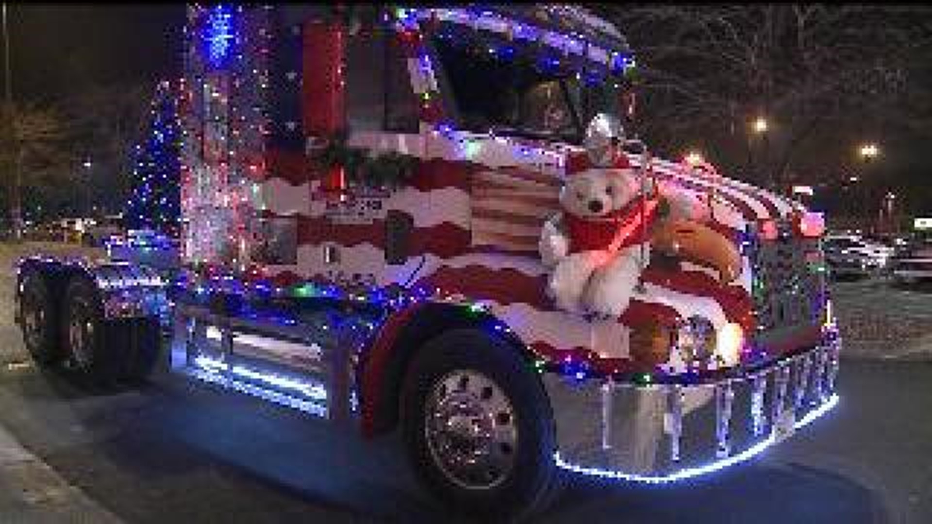 Grinch truck delivers holiday cheer and hope to the QCA