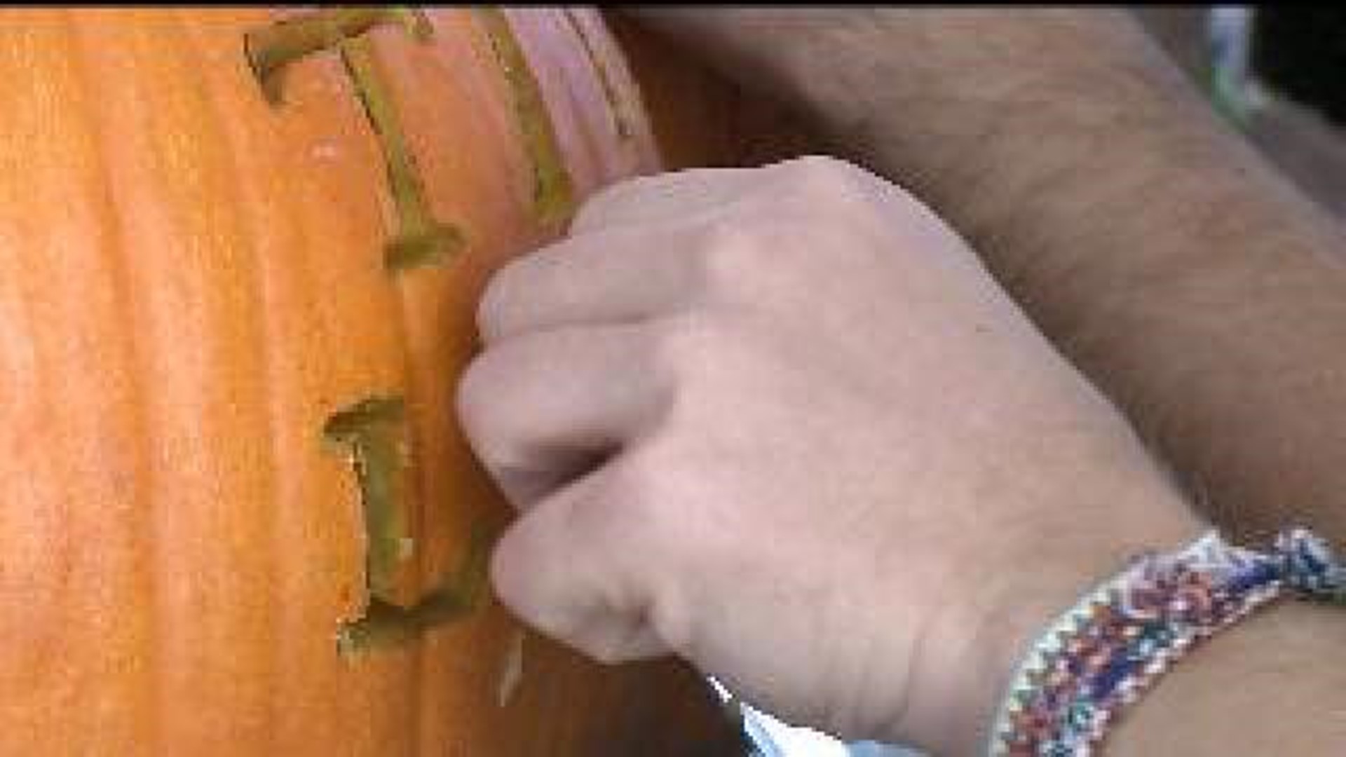 Fraternity carves pumpkins for a cause