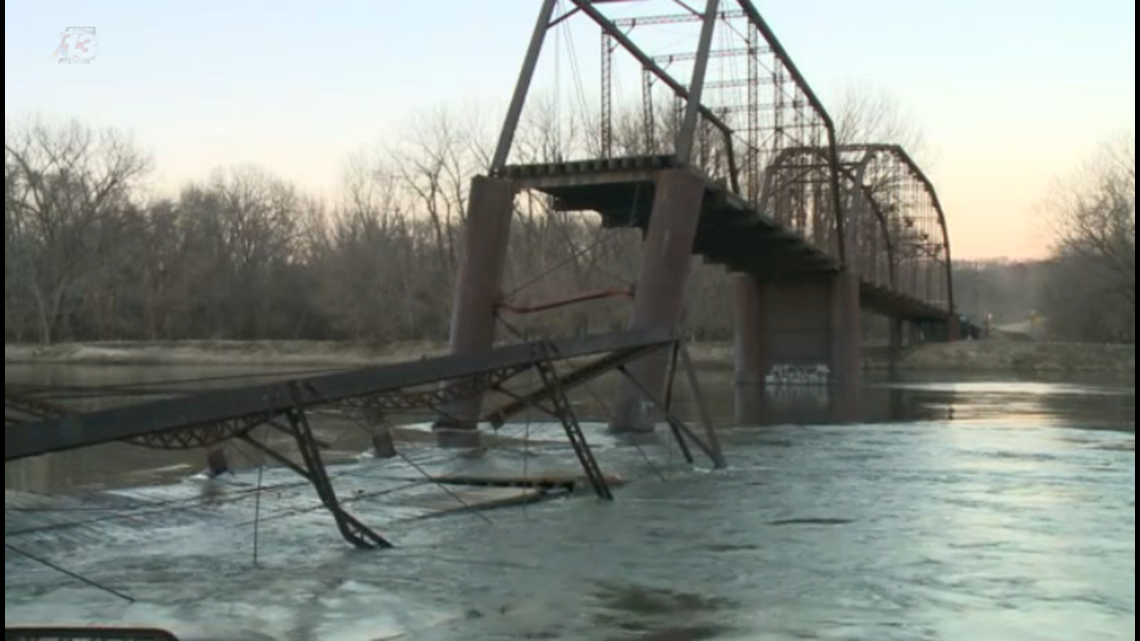 Historic Iowa bridge partially collapses into Des Moines River