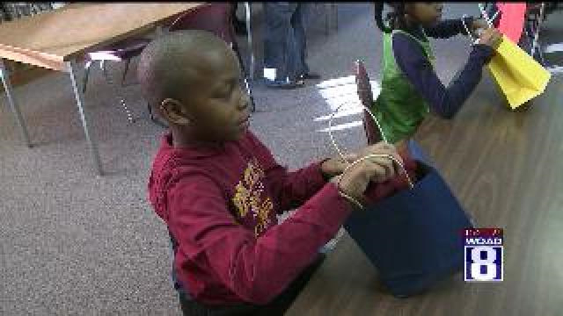 Church Group Gives New Hat and Gloves to Area Students