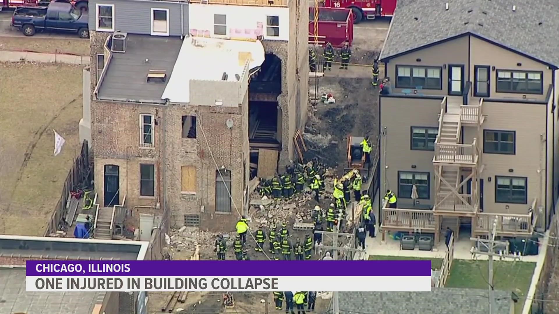 Fire officials say a worker has died after a Chicago building partially collapsed, trapping him beneath debris.