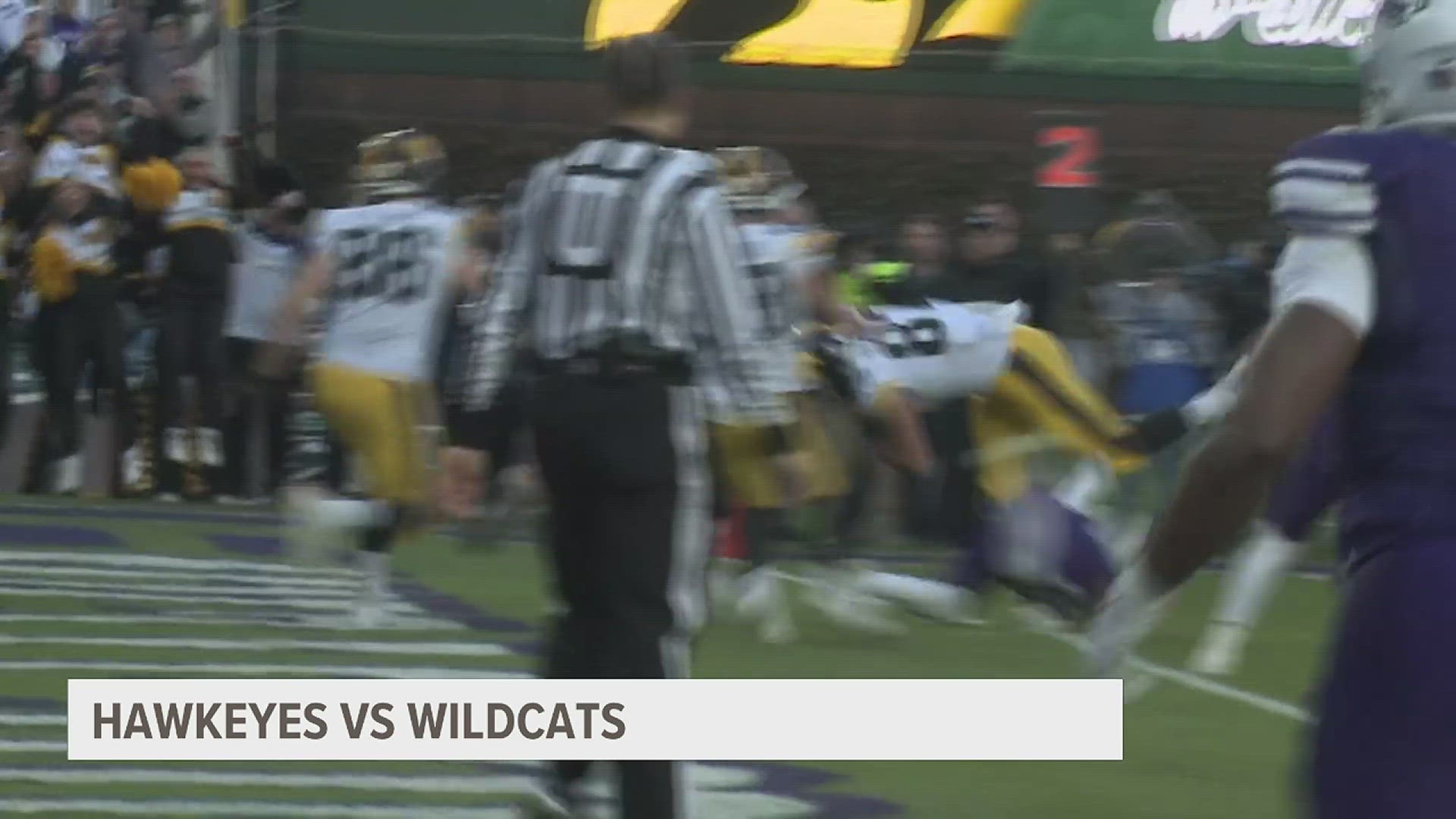 Iowa gets a wins over Northwestern in a low scoring affair at Wrigley Field.