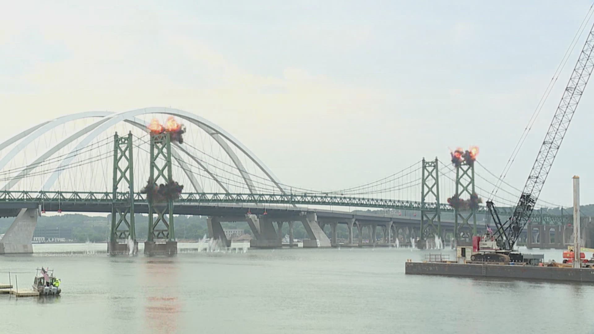 Helm Group, the demolition contractor, used controlled explosives to remove the suspension cables and towers on the eastbound bridge.