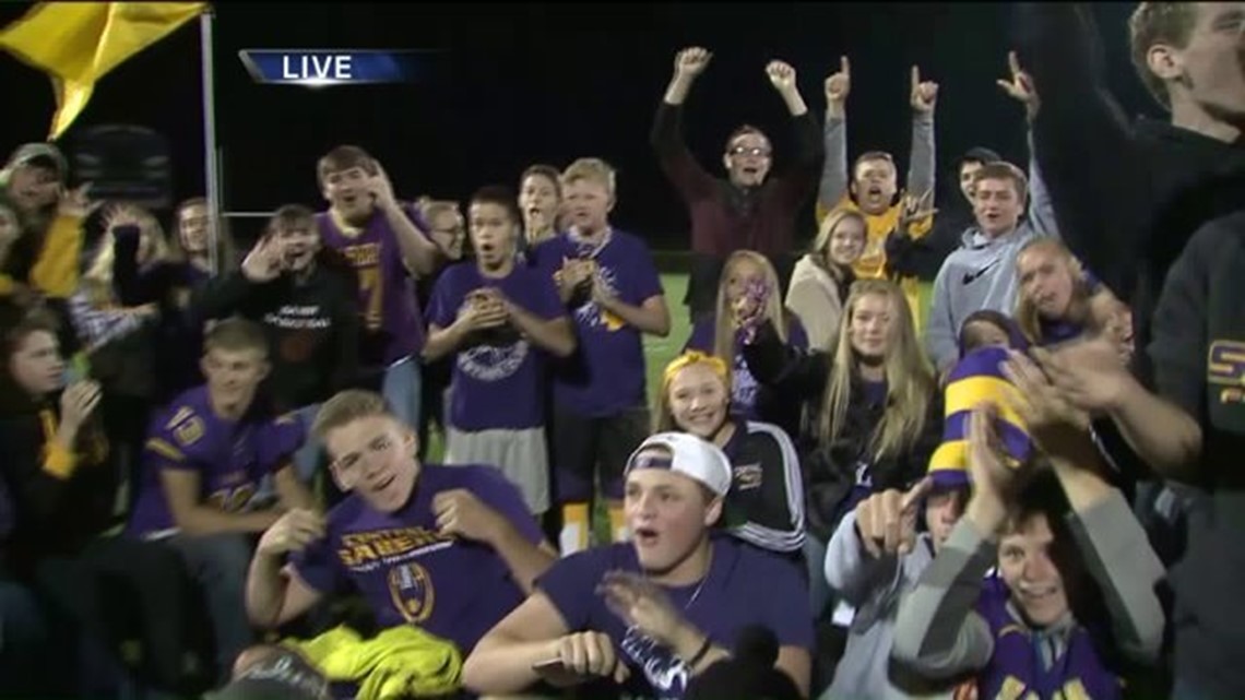 Central DeWitt Sabers Celebrate During GMQC Score PeGame