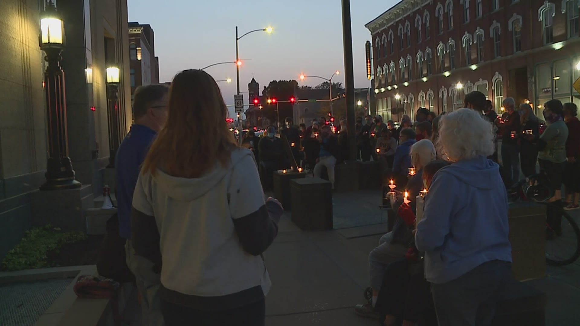 Dozens of people from the Quad Cities gathered in downtown Davenport to pay their respects to Justice Ginsburg.