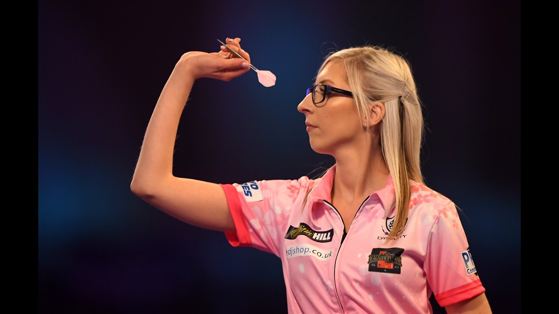 Female darts star beats a 2nd man at PDC World Championship