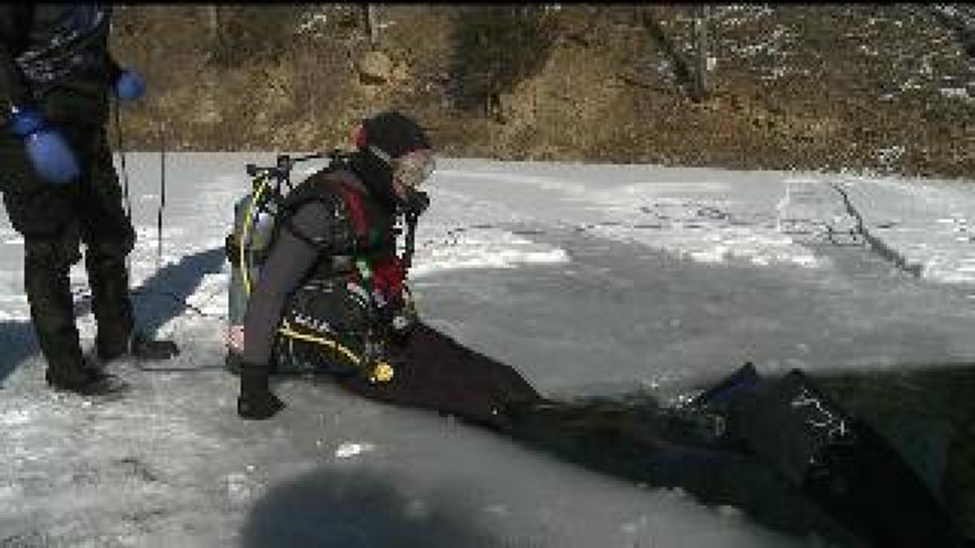 Divers brave frigid water for certification