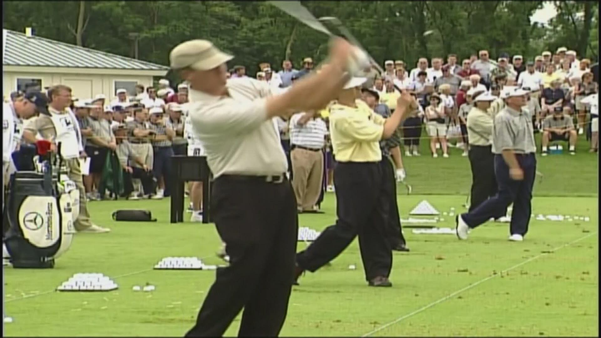 Golfers and fans give their opinions of Deere Run on its first tournament in 2000.