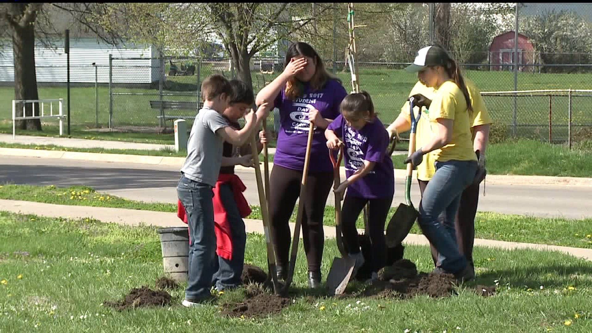 Kids replant trees in Muscatine