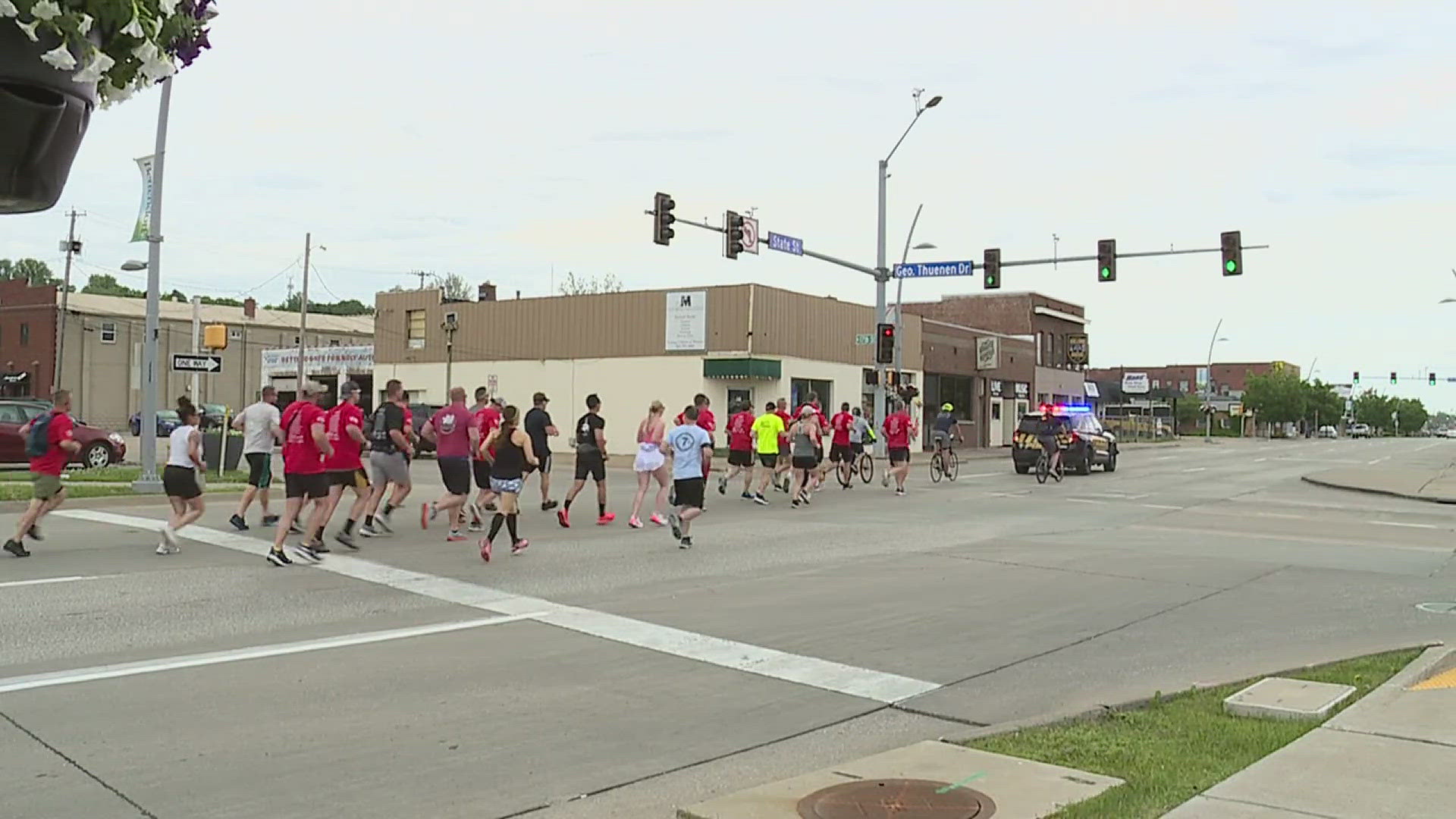 25 officers carried the flame of hope for six miles.