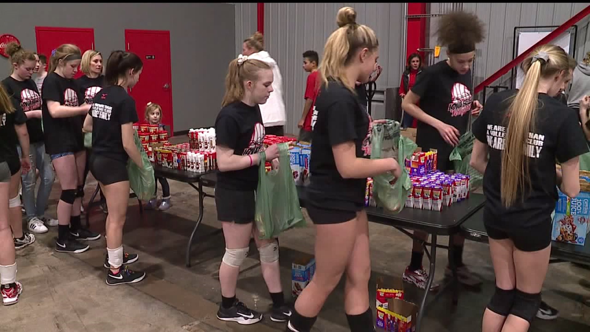 These volleyball players are fighting food insecurity in the Quad Cities