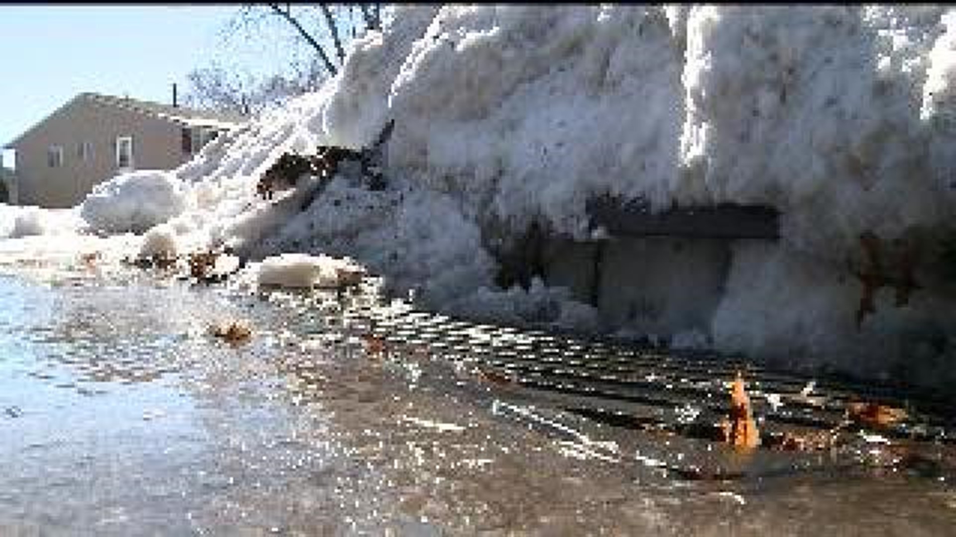 Snow melts and streets flood in Quad Cities
