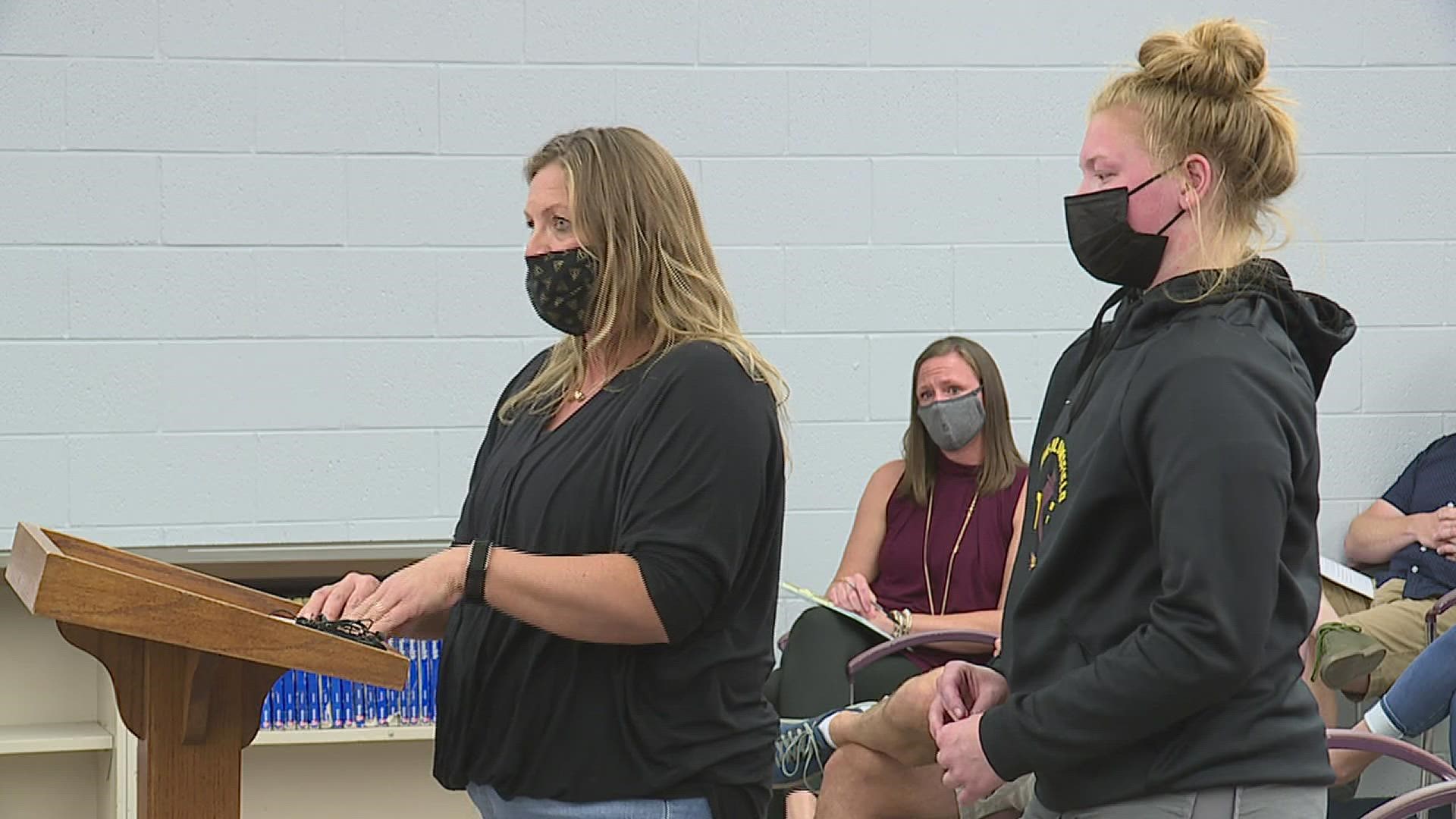 The school board voted against the proposed back-to-school plan because of its mask mandate. This comes a day after an outbreak was found on the football team.