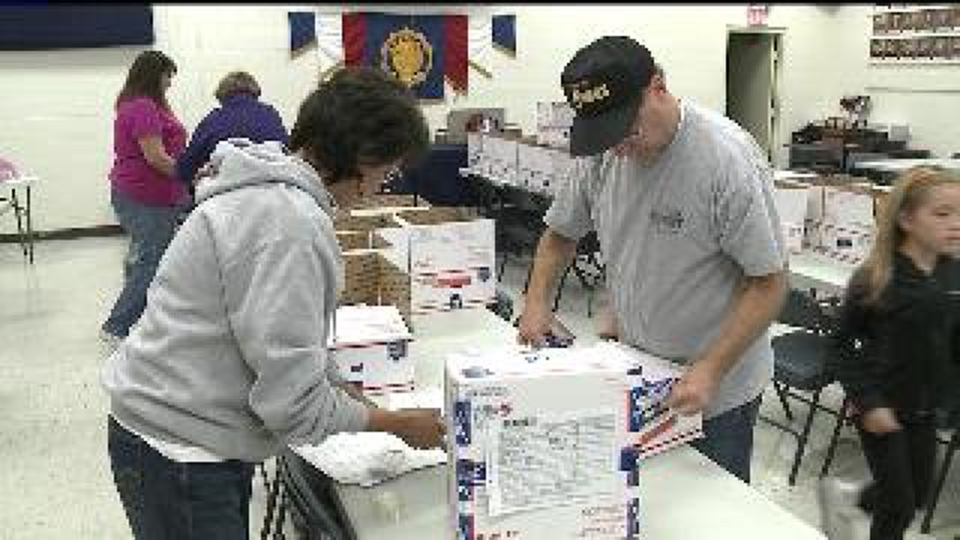 Community Packs Boxes For Sailors At Sea