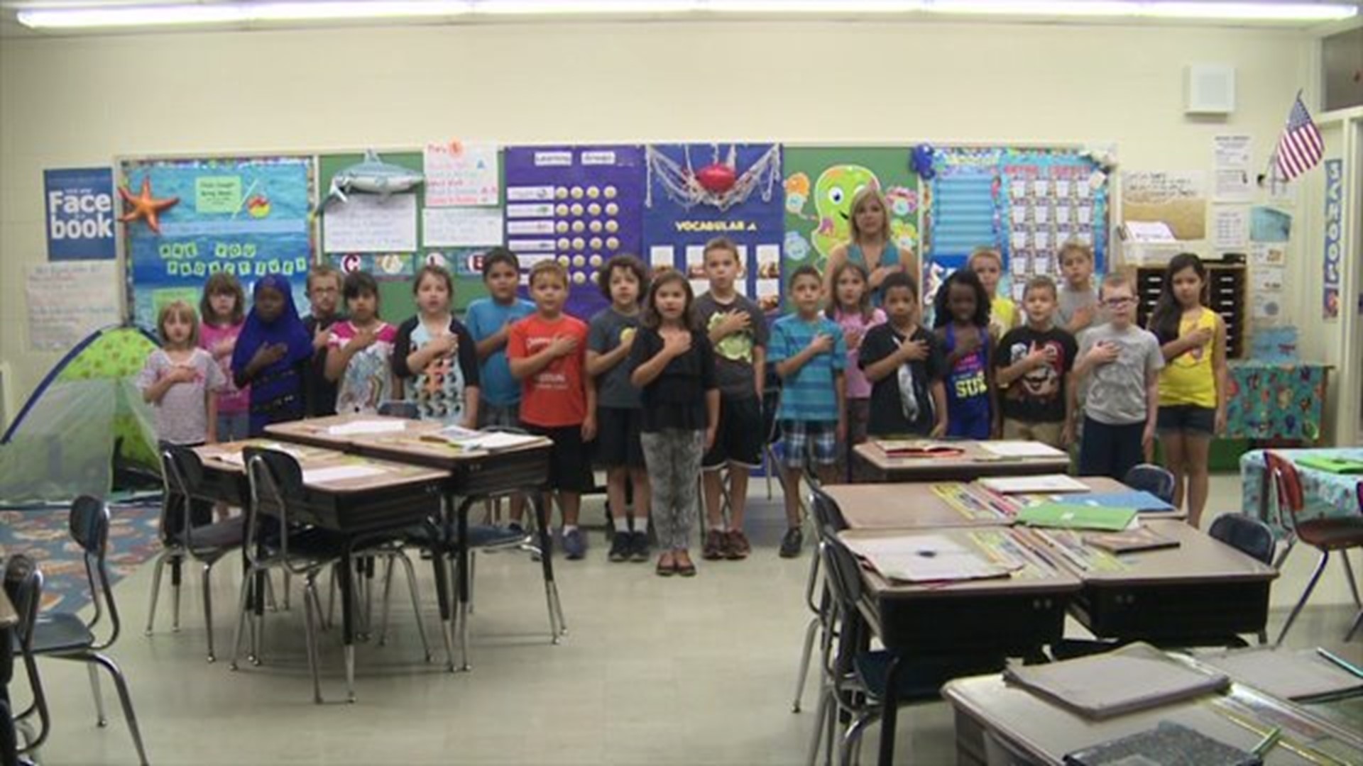 Ms. Jayne`s class says the Pledge of Allegiance