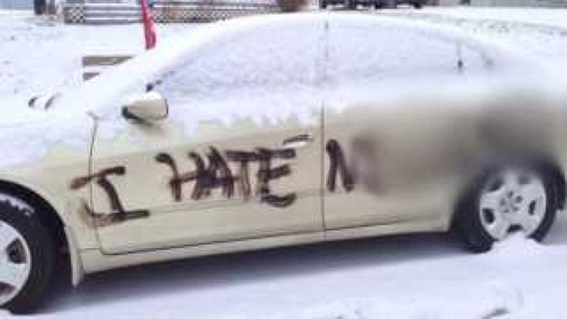 Racial slurs painted on cars in Davenport neighborhood