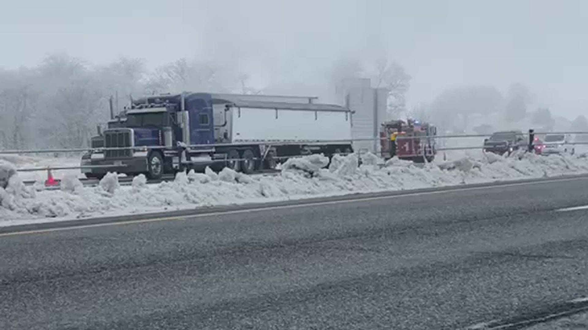 A semi was pulled over as smoke poured from the vehicle Monday, Jan. 4, 2021.