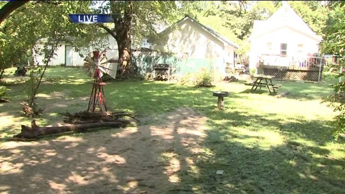 Buildings and roadways flooded in Dixon this morning