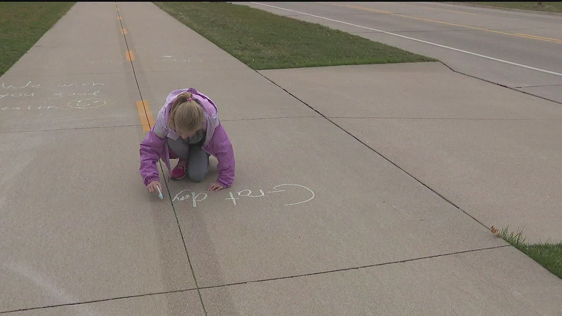 Local girl creates Positive Chalk Messages
