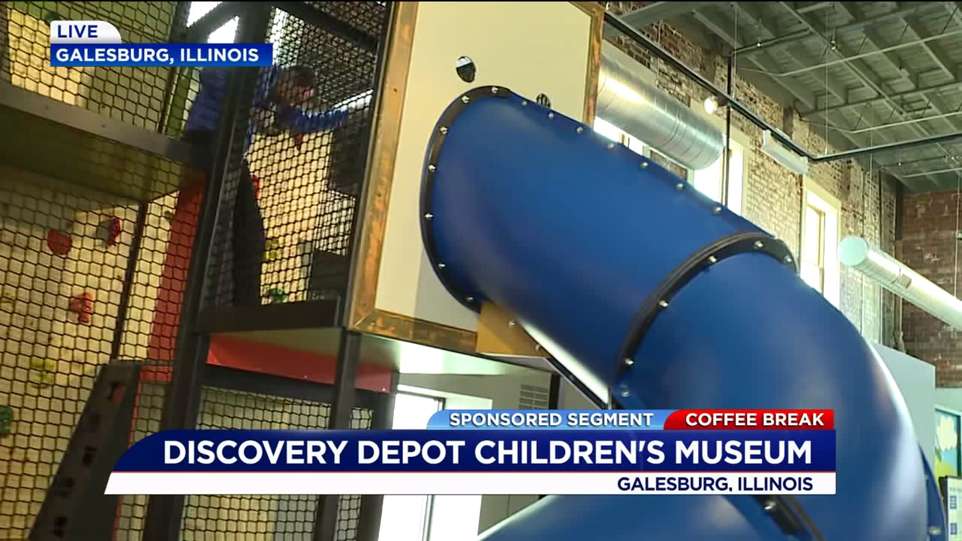 Jon Ketz tries the slide at Discovery Depot