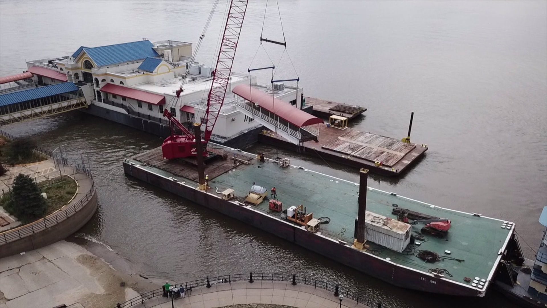Walkways removed as casino barge prepares to leave Davenport