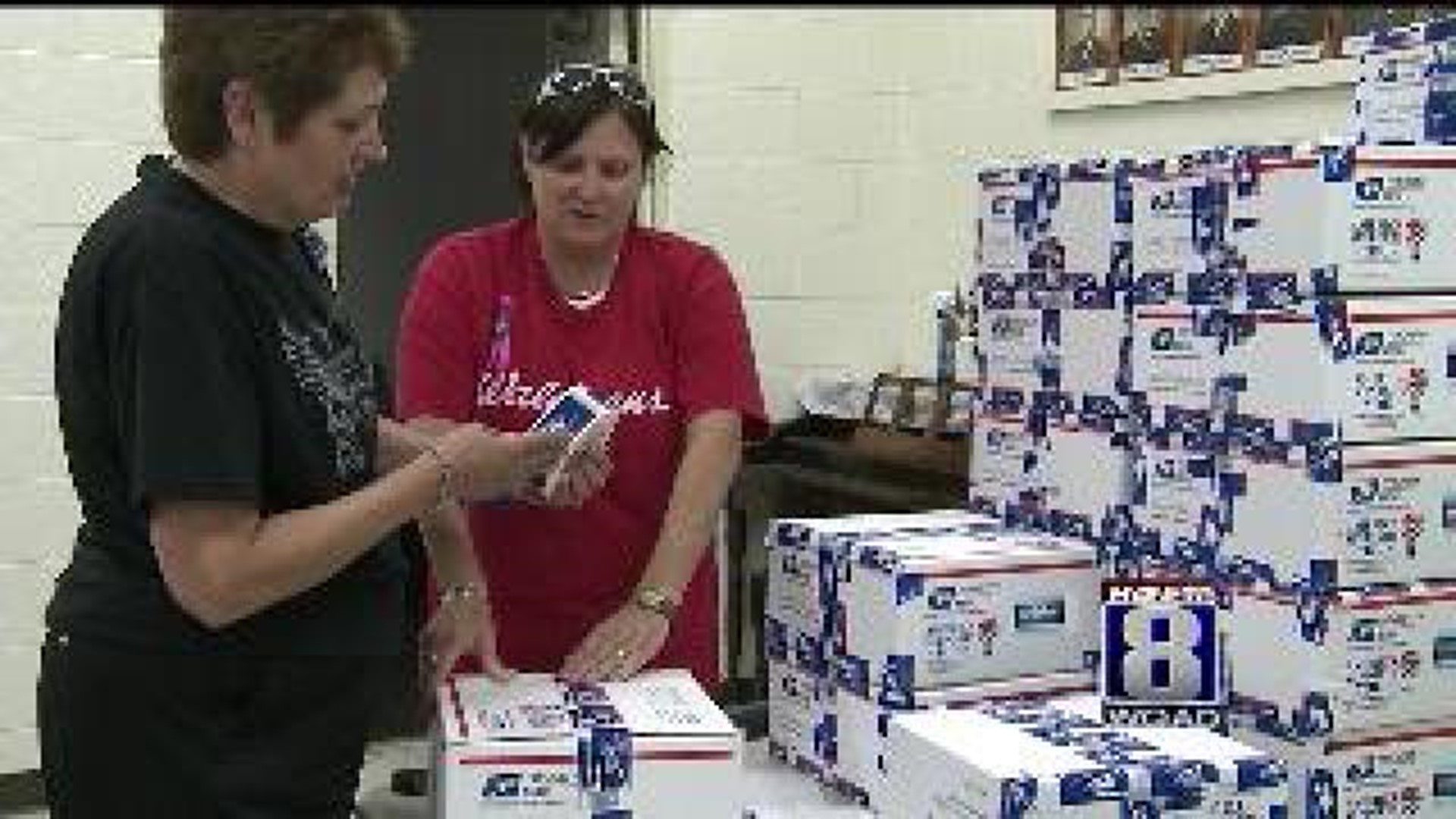 Area volunteers ship care boxes to deployed military