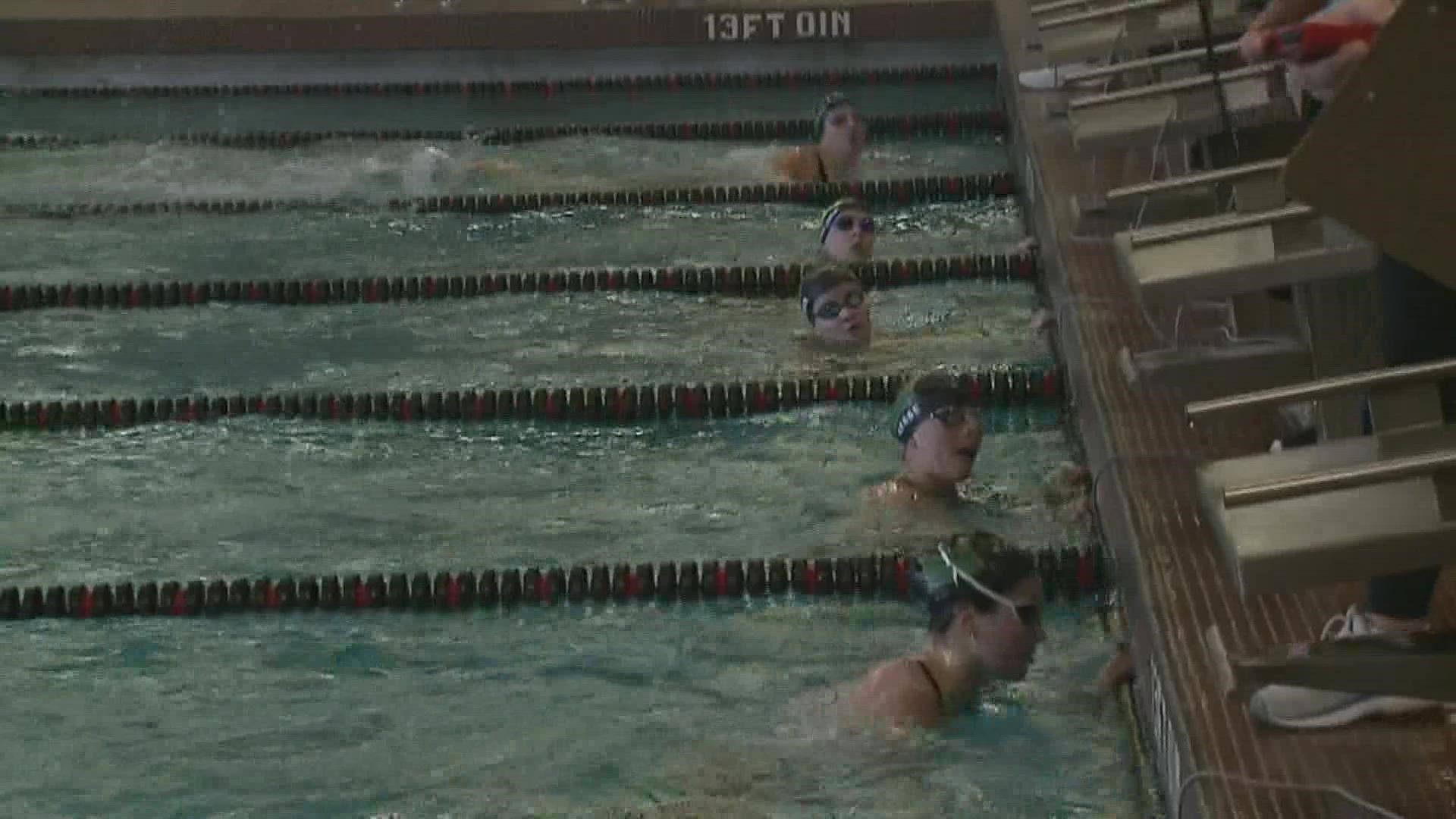 Swimmers in Iowa dive into the pool in Clinton with a chance of making it to the State Meet next week.