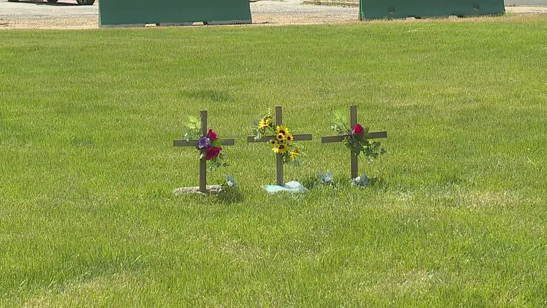 A few dozen people gathered just up the street from the collapse site to remember those who died and the impact the event left on the community.