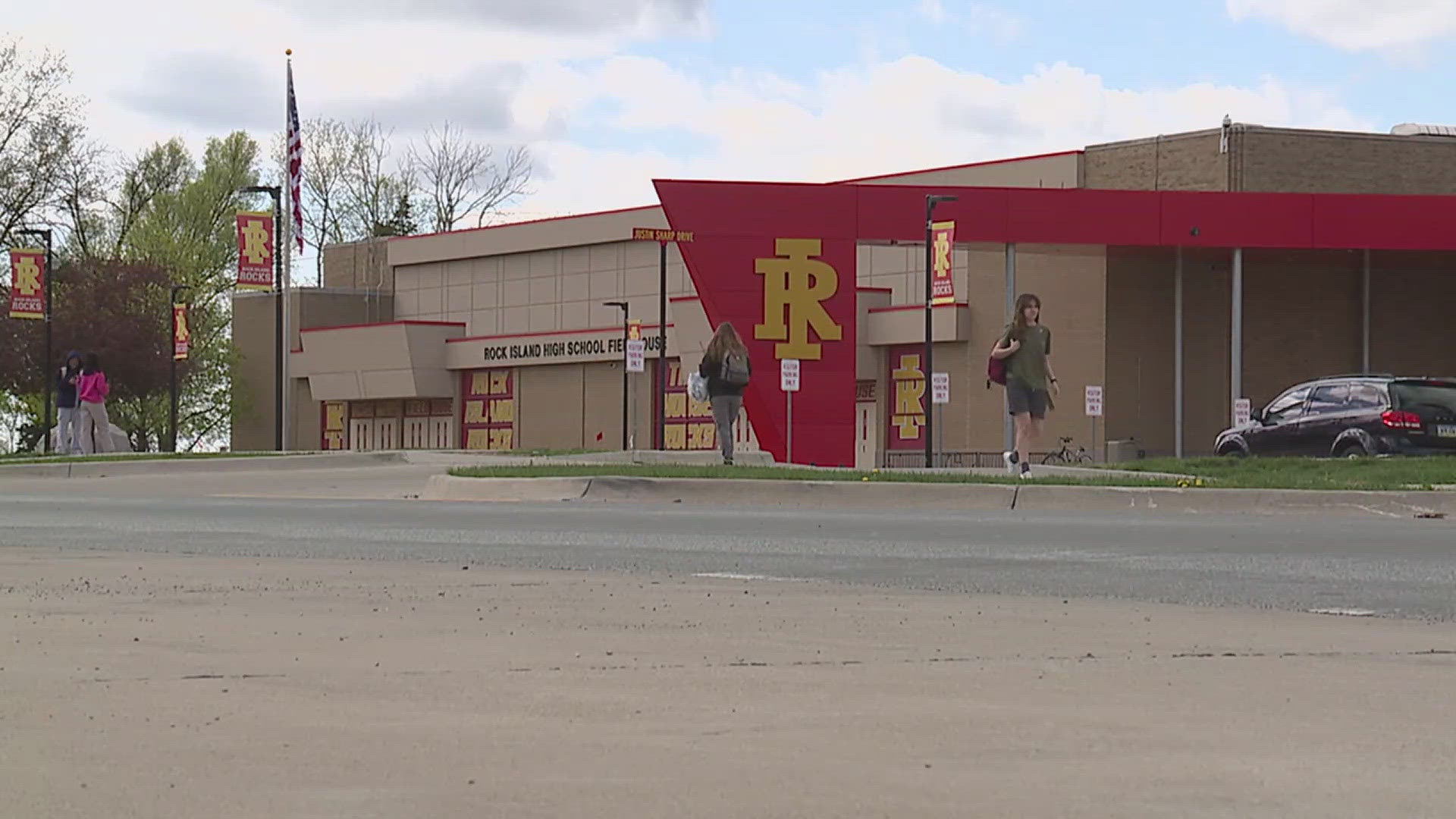 The school was temporarily placed on lockdown after a student was found with a handgun in their backpack.