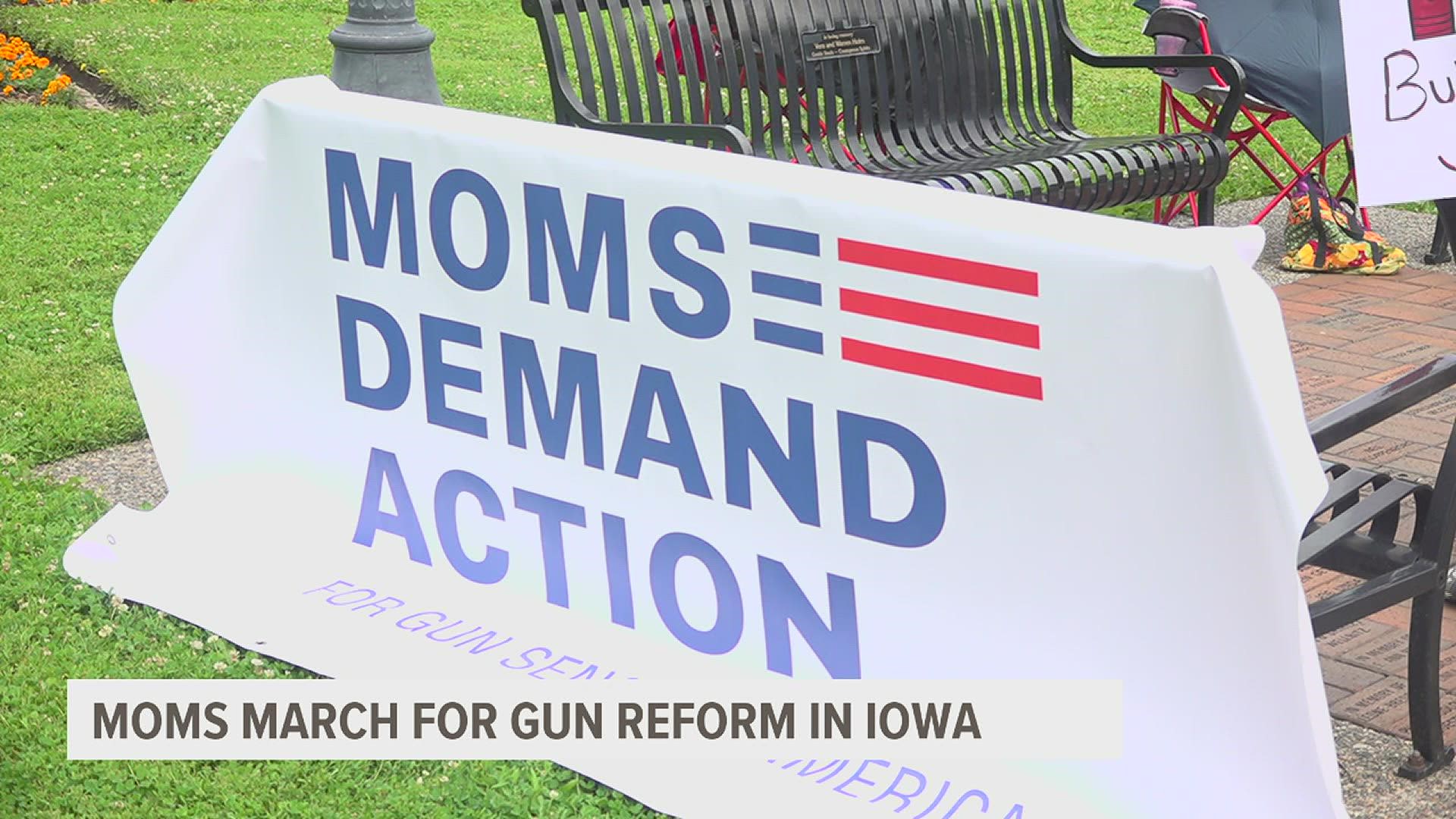The moms marched at Vander Veer Park in favor of gun reform and asked Iowa legislators to reject a piece of a constitutional amendment head to Iowa ballots in Nov.