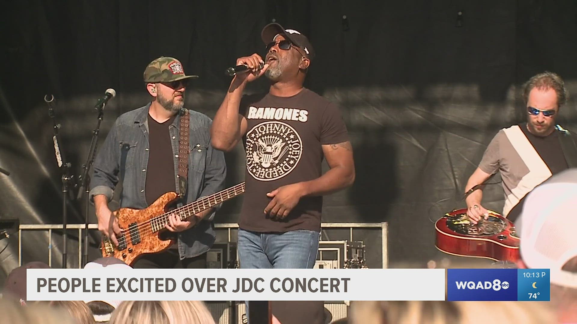 An image of Darius Rucker singing the National Anthem is projected