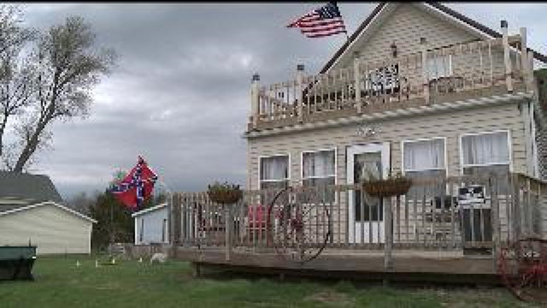 Town conflicted over flag flown at mayor's house