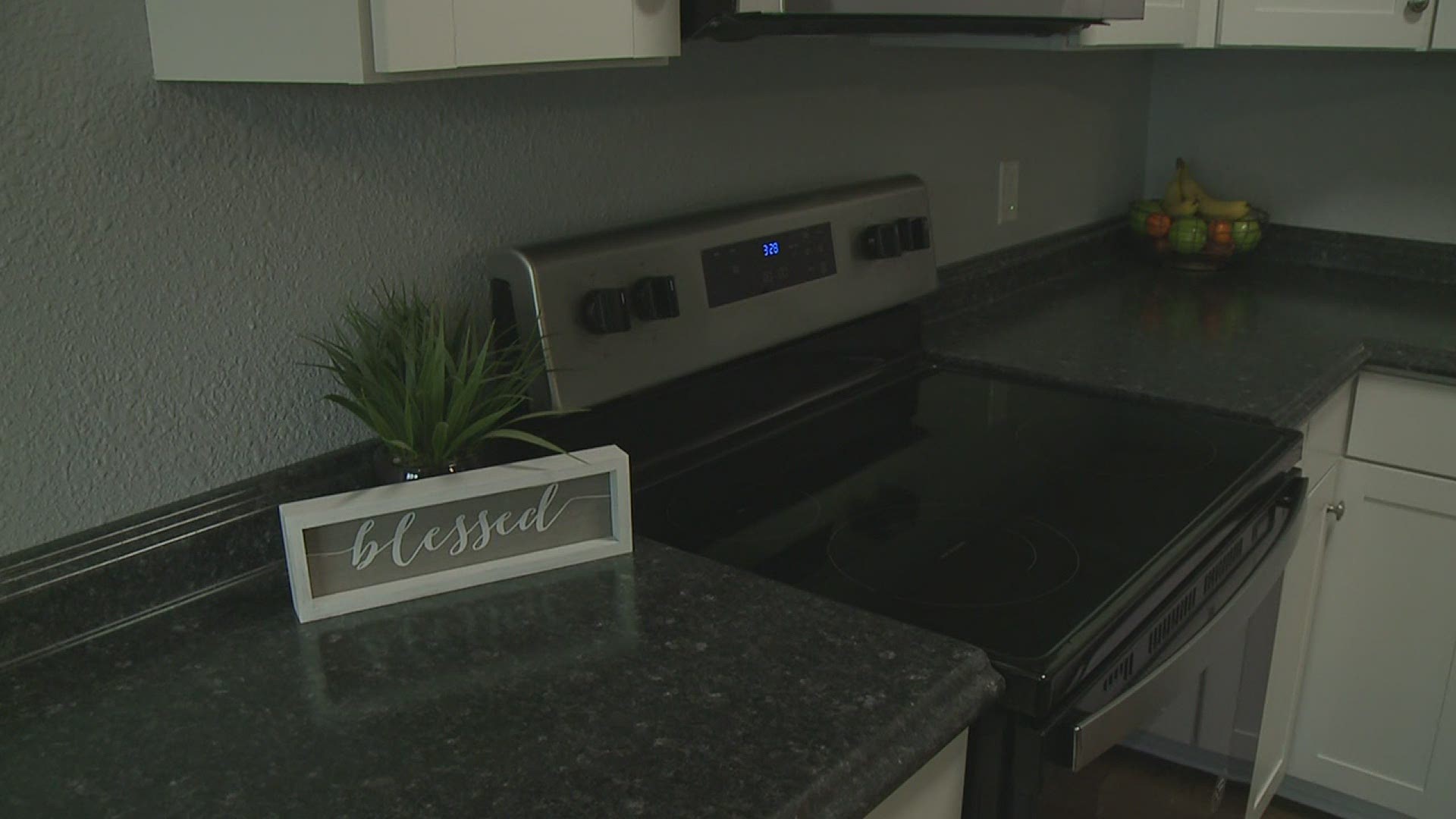 The two 400-square-foot houses were unveiled Thursday afternoon. Community members toured the homes before the news owners move in.