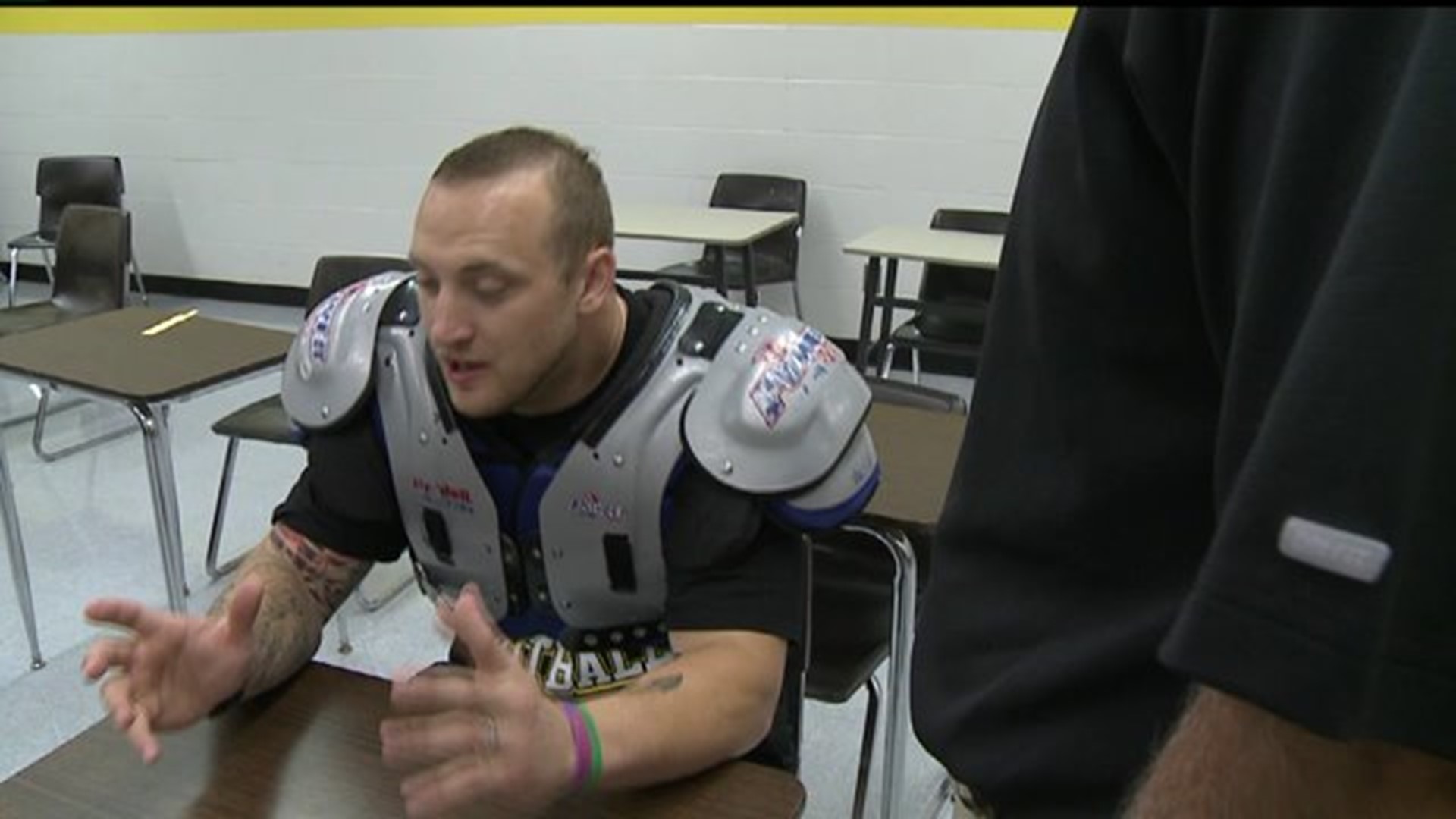 Bettendorf great Pat Angerer kicks off The Score with help from his former  head coach