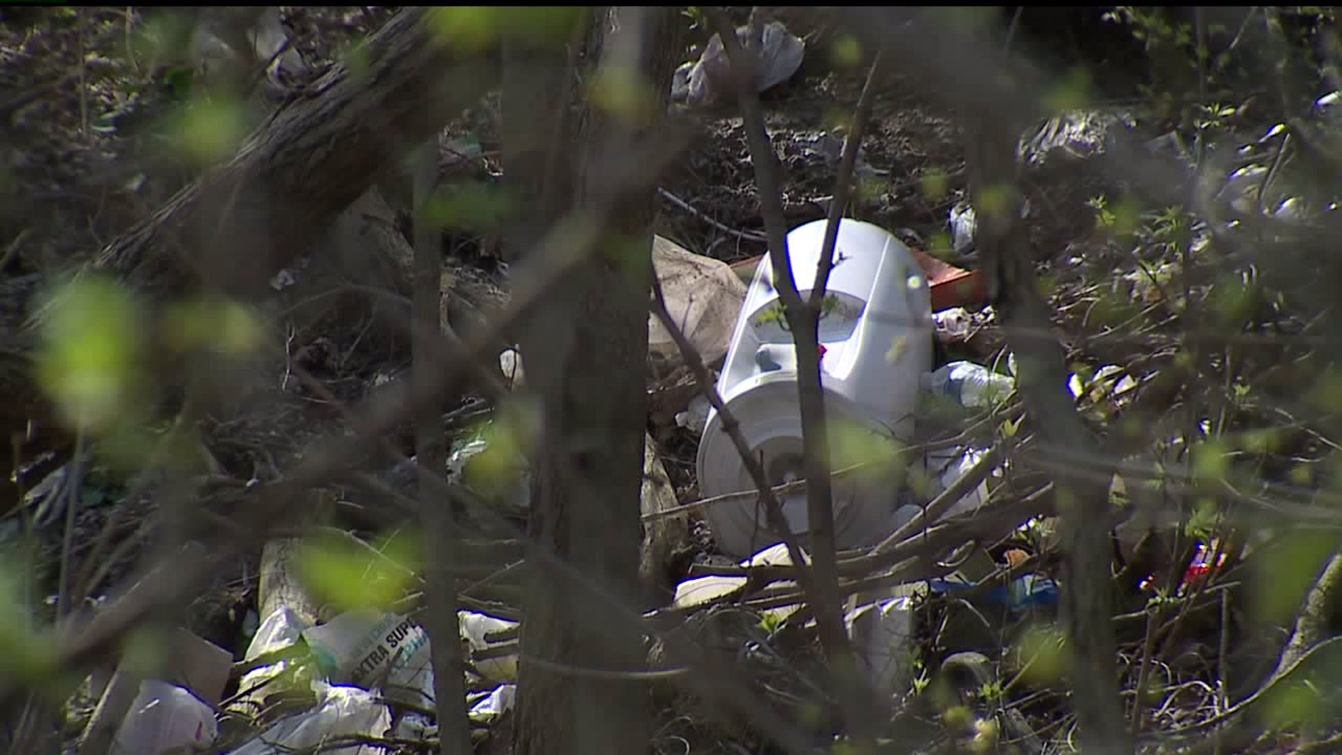 Rock Island apartment trash blowing into community garden