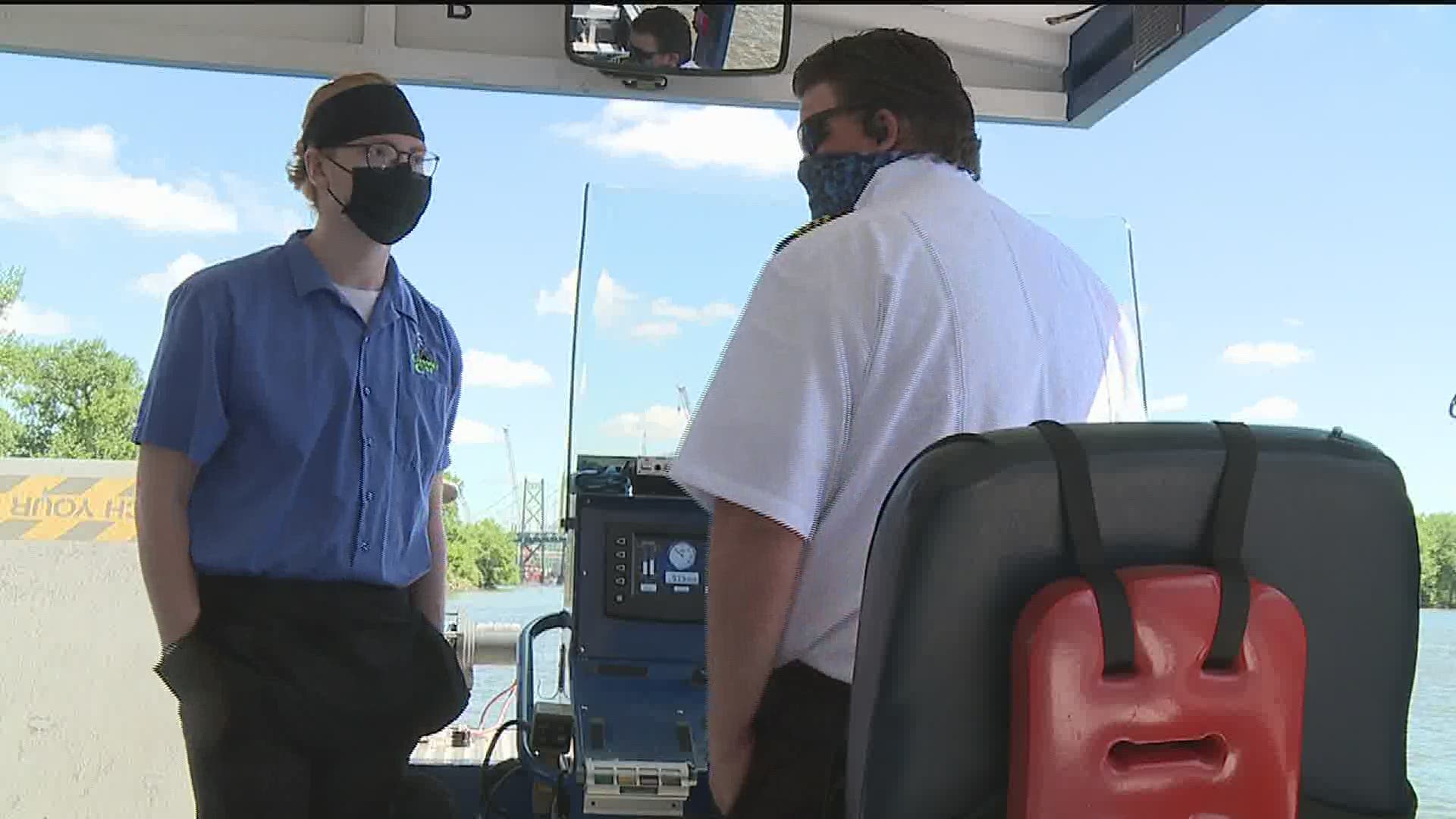 The water taxi service is operating at half-capacity and riders are encouraged to wear face masks.
